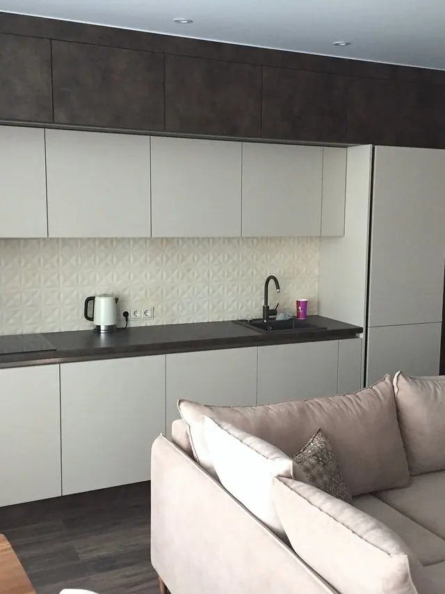 Kitchen with tall cabinets