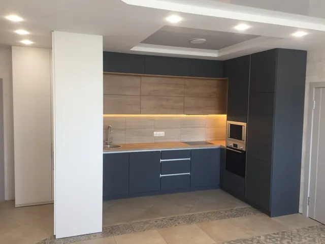 Two-tone kitchen with LED strip